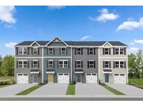 Four townhouses with attached garages, neutral siding, and landscaped lawns at 4505 Black Drum Dr, Raleigh, NC 27616