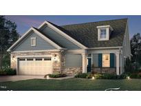 Stunning two-story home with a charming facade and attached garage at 1009 Middleground Cir, Durham, NC 27713