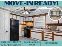 Bright kitchen features updated appliances and ample cabinetry at 408 W Main St, Pine Level, NC 27568