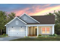 Two-story home with gray siding, brick accents, and a two-car garage at 776 Denburn Pl, Raleigh, NC 27603