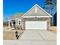 Newly constructed craftsman style home with stone and board and batten accents at 456 Glover Park Memorial Drive, Nashville, NC 27856
