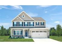 Two-story house with gray siding, white trim, and a two-car garage at 1008 Country Pasture Cv, Wendell, NC 27591