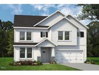 Two-story home with white siding, gray roof, and a two-car garage at 1912 Old Bramble Ln # 7, Fuquay Varina, NC 27526