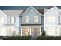 Two-story townhome with gray siding, brick accents, and landscaping at 365 Fosterton Cottage Way, Raleigh, NC 27603