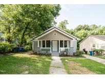 Charming renovated bungalow with a welcoming front porch at 2612 Ashe St, Durham, NC 27703
