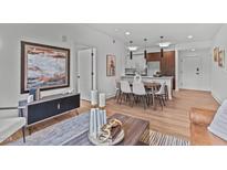 Bright living and dining area with modern furnishings and decor at 615 W Peace St # 308, Raleigh, NC 27605