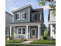 Charming two-story home featuring a covered porch, a combination of siding, complemented by black shutters at 942 Allen Park Dr, Knightdale, NC 27604