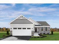 One-story home with gray siding, stone accents, and a two-car garage at 38 Brazan Ct, Fuquay Varina, NC 27526