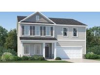 Two story house with gray siding, stone accents, and a two car garage at 605 Morning Light Dr, Angier, NC 27501