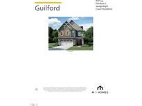 Two-story home with grey siding, white trim, and a black roof at 2488 Field Poppy Drive Dr # 174, Apex, NC 27502