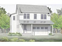 Two-story house with white siding, gray roof, and a two-car garage at 1729 Birdhaven Ln, Wendell, NC 27591