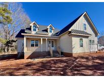 Craftsman style home with front porch and metal roof at 20 Tamaran Ct, Spring Hope, NC 27882