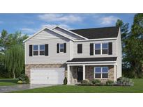 Two-story home with gray siding, brick accents, and a two-car garage at 263 Hanging Elm Ln, Fuquay Varina, NC 27526