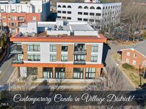 Contemporary condo building in the Village District with modern design at 615 Daniels St # 316, Raleigh, NC 27605