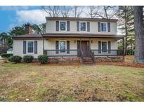 Two-story house with brown accents and a covered porch at 713 Dana Ln, Rocky Mount, NC 27803