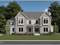 Two-story home with gray siding, shutters, and a covered porch at 1609 Legacy Ridge Ln, Wake Forest, NC 27587