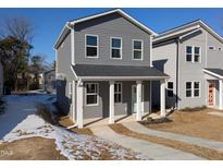 Gray two-story house with a front porch and walkway at 110-B S Hyde Park Ave, Durham, NC 27703