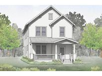 Two-story craftsman style home with front porch and landscaping at 129 Mossy Falls Way, Wendell, NC 27591