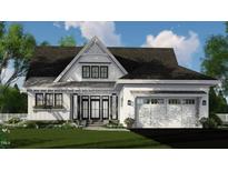 Beautiful two-story farmhouse with a large front porch and attached garage at 2417 Bivins Rd, Durham, NC 27712