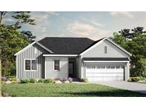 One-story home with gray siding, two-car garage, and landscaping at 116 Mohave Dr, Louisburg, NC 27549