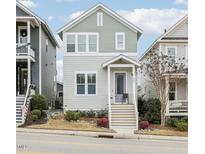 Gray two-story house with front porch and landscaping at 282 Granite Mill Blvd, Chapel Hill, NC 27516