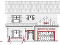 Two-story home with horizontal siding, attached garage, and front porch at 4238 Darroch Rd, Lillington, NC 27546