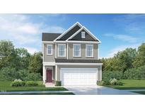 Two-story house with gray siding, white garage door, and maroon front door at 1185 Atterlee Ln, Graham, NC 27253