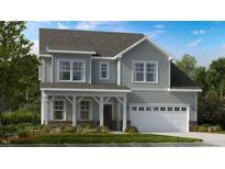 Two-story home with gray siding, white trim, and a covered porch at 661 Morning Glade St, Wake Forest, NC 27587