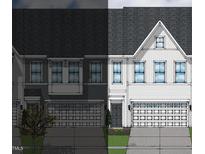 Two-story townhome with attached garage and front landscaping at 194 Nimble Way # 217, Clayton, NC 27520