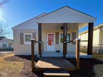 Updated bungalow with a charming front porch and walkway at 1220 Garner Rd, Raleigh, NC 27610