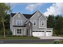 Two-story house with gray siding, stone accents, and a three-car garage at 1117 Opal Ln # 73, Durham, NC 27705