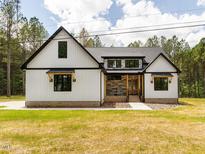 Charming new construction home with modern farmhouse design and beautiful curb appeal at 1040 Southern High School Rd, Burlington, NC 27215
