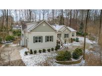 Two-story house with light gray siding, and a stone walkway leading to the front door at 4132 Mountainbrook Rd, Apex, NC 27539