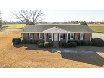Brick ranch house with large yard, seen from above at 6793 Stricklands Crossroads Rd, Four Oaks, NC 27524