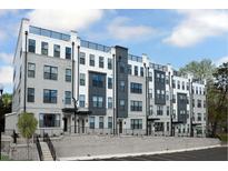 Stylish new townhome community boasts modern architectural details and multiple stories at 109 Ailey Brook Way # 100, Wake Forest, NC 27587