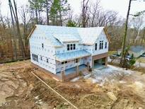 Aerial view of a new two-story home under construction, showcasing its design and layout at 301 W College St, Louisburg, NC 27549