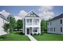 Two-story Craftsman style home with light green siding, and a walkway at 739 Georgia'S Landing Pkwy # 113, Raleigh, NC 27603