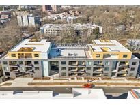 Aerial view of modern apartment building with rooftop deck at 29 Enterprise St # 309, Raleigh, NC 27607