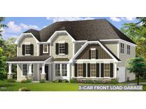 Beautiful home featuring neutral siding, black shutters, and a convenient 3-car front load garage at 23 Frost Meadow Way, Lillington, NC 27546