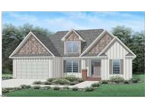 Craftsman style home with shingle accents and a two-car garage at 55 Councel Williams Rd, Coats, NC 27521