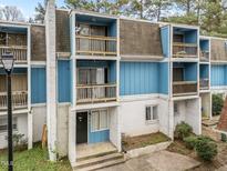 Two-story building with light blue siding and balconies at 7002 Longstreet Dr # C, Raleigh, NC 27615