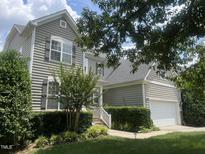 Charming two-story home featuring a well-maintained lawn, attached garage, and neutral siding at 3905 Song Sparrow Dr, Wake Forest, NC 27587