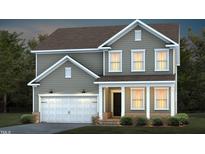 Two-story house with gray siding, white garage door, and landscaping at 769 Denburn Pl, Raleigh, NC 27603