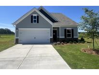 Charming single-Gathering home with a two-car garage and well-manicured lawn, offering curb appeal at 14 E American Marigold Dr # 65, Benson, NC 27504