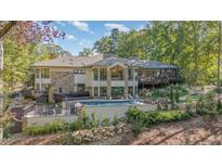 Luxury home with pool and expansive wooded lot at 12044 Iredell, Chapel Hill, NC 27517
