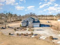 Stunning two-story home with large backyard and long driveway at 430 Federal Rd, Benson, NC 27504