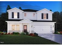 Charming two-story home featuring a covered porch and a two-car garage at 1760 Pie Filling Dr, Haw River, NC 27258