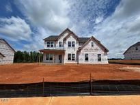 Charming two-story home featuring a classic architectural design, situated on a spacious lot at 110 Tennyson Dr, Garner, NC 27529