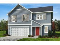 Two-story house with gray siding, red door, and a two-car garage at 253 Windsor Mill Rd, Rolesville, NC 27571