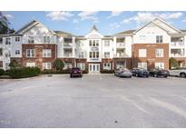 Brick building exterior with parking and landscaping at 617 Eyam Hall Ln, Apex, NC 27502